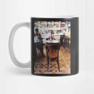 People in Italian Restaurant Out of Focus Mug